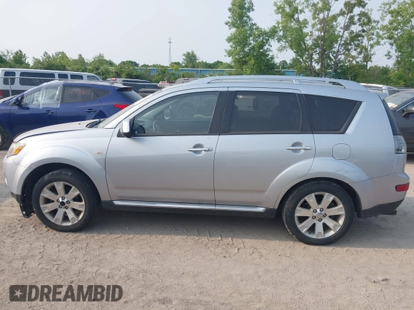2009 Mitsubishi Outlander SE with VIN JA4LT31W09Z014816, listed as a IAAI auction lot 42399219 with 188,136 mi miles and . Bid and sale history available at DreamBid. Image 14.