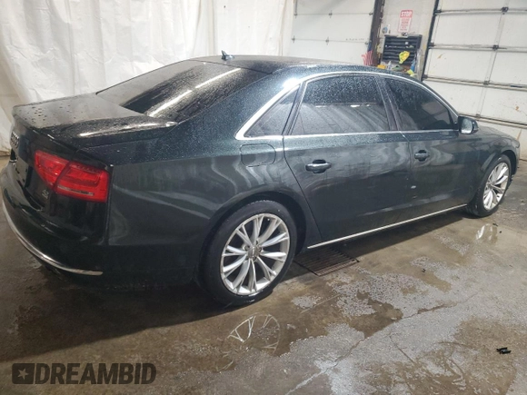 2011 Audi A8 z VIN WAURVAFD7BN006275, wystawiony jako Copart lot #58306205 z przebiegiem 190 383 mil mil oraz Szkody całkowita. Historia ofert i sprzedaży dostępna na DreamBid. Obrazek 3.