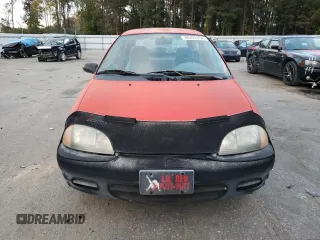 2001 Suzuki Swift GA z VIN 2S2AB21H216604405, wystawiony jako Copart lot #80427254 z przebiegiem 63 703 mil mil oraz Tytuł czysty. Historia ofert i sprzedaży dostępna na DreamBid. Obrazek 5.