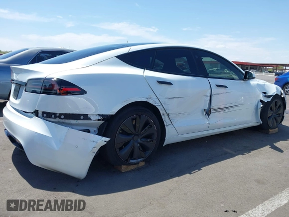 2022 Tesla Model S с VIN 5YJSA1E55NF486538, выставлен на аукционе IAAI как лот 42660966 с пробегом 41 465 миль миль и . История ставок и продаж доступна на DreamBid. Изображение 6.