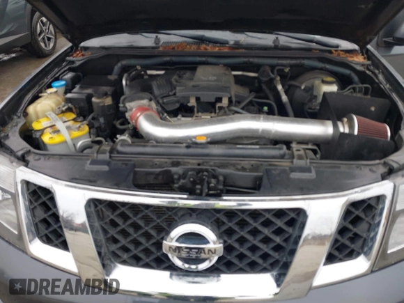 2010 Nissan Pathfinder LE with VIN 5N1AR1NB8AC618785, listed as a IAAI auction lot 41774406 with 172,200 mi miles and . Bid and sale history available at DreamBid. Image 10.