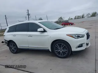 2019 Infiniti QX60 LUXE with VIN 5N1DL0MN2KC551218, listed as a IAAI auction lot 41101804 with 111,621 mi miles. Bid and sale history available at carsss.com. Image 13.