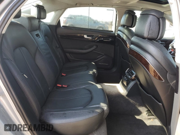 2012 Audi A8 with VIN WAURVAFD8CN018131, listed as a Copart auction lot 54260395 with 98,706 mi miles and Salvage title. Bid and sale history available at DreamBid. Image 10.