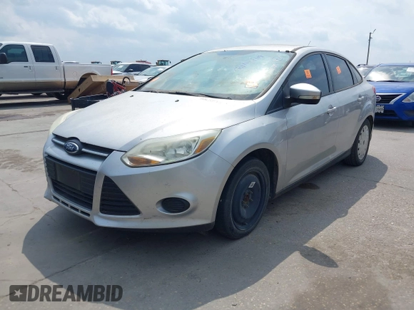 2013 Ford Focus SE with VIN 1FADP3F25DL138117, listed as a IAAI auction lot 42162119 with 136,979 mi miles. Bid and sale history available at carsss.com. Image 2.