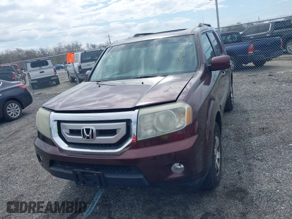 2010 Honda Pilot Touring with VIN 5FNYF4H95AB040721, listed as a IAAI auction lot 41928412 with 213,219 mi miles and . Bid and sale history available at carsss.com. Image 12.