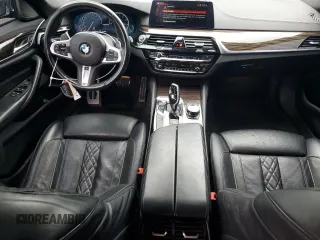 2018 BMW 5 Series M550i xDrive with VIN WBAJB9C54JB286707, listed as a Copart auction lot 49158435 with 74,307 mi miles and Salvage title. Bid and sale history available at DreamBid. Image 8.