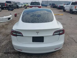 2019 Tesla Model 3 Mid Range with VIN 5YJ3E1EA8KF472540, listed as a IAAI auction lot 41661312 with 75,575 mi miles and . Bid and sale history available at DreamBid. Image 17.