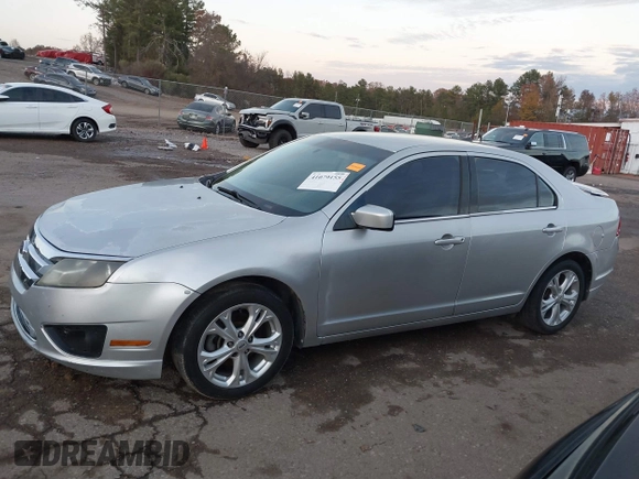 2012 Ford Fusion SE z VIN 3FAHP0HA4CR213409, wystawiony jako IAAI lot #41079155 z przebiegiem 139 129 mil mil oraz . Historia ofert i sprzedaży dostępna na DreamBid. Obrazek 13.
