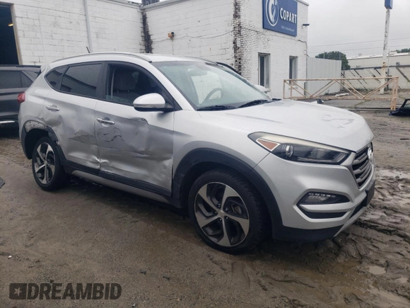 2017 Hyundai Tucson Sport with VIN KM8J33A23HU355807, listed as a Copart auction lot 58431795 with 127,353 mi miles and Salvage title. Bid and sale history available at DreamBid. Image 4.
