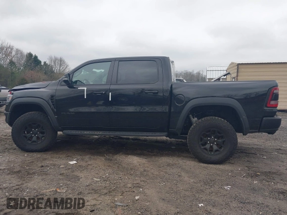 2022 Ram 1500 TRX with VIN 1C6SRFU9XNN476106, listed as a IAAI auction lot 41627895 with 21,992 mi miles and . Bid and sale history available at DreamBid. Image 14.