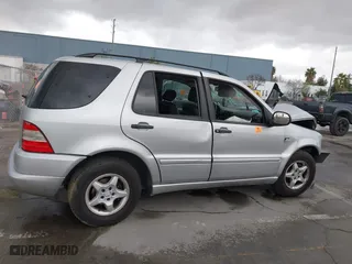 2001 Mercedes-Benz M-Class with VIN 4JGAB54E61A237617, listed as a IAAI auction lot 41788348 with 178,752 mi miles. Bid and sale history available at carsss.com. Image 13.