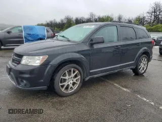 2013 Dodge Journey R/T with VIN 3C4PDDEG5DT597459, listed as a Copart auction lot 58715085 with 152,483 mi miles and Clean title. Bid and sale history available at DreamBid. Image 1.