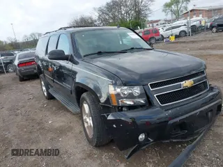 2013 Chevrolet Suburban LT with VIN 1GNSKJE70DR284785, listed as a IAAI auction lot 41838484 with 113,696 mi miles and . Bid and sale history available at DreamBid. Image 1.