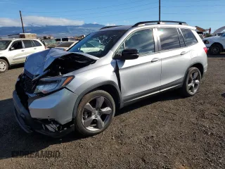 2020 Honda Passport Touring with VIN 5FNYF7H95LB006508, listed as a Copart auction lot 82423674 with 29,751 mi miles and Salvage Title. Bid and sale history available at DreamBid. Image 1.