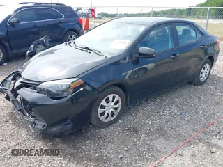 2019 Toyota Corolla L z VIN 2T1BURHEXKC200801, wystawiony jako IAAI lot #42289440 z przebiegiem 114 765 mil mil oraz . Historia ofert i sprzedaży dostępna na DreamBid. Obrazek 2.