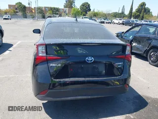2019 Toyota Prius L Eco with VIN JTDKARFU0K3087064, listed as a IAAI auction lot 41986365 with 81,735 mi miles. Bid and sale history available at carsss.com. Image 16.
