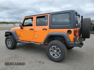 2013 Jeep Wrangler Unlimited Sport z VIN 1C4BJWDG7DL522421, wystawiony jako Copart lot #73010024 z przebiegiem 55 915 mil mil oraz Tytuł czysty. Historia ofert i sprzedaży dostępna na DreamBid. Obrazek 2.