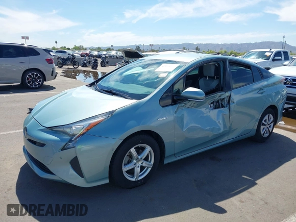 2018 Toyota Prius Two with VIN JTDKBRFUXJ3066430, listed as a IAAI auction lot 42034812 with 119,711 mi miles and . Bid and sale history available at carsss.com. Image 2.