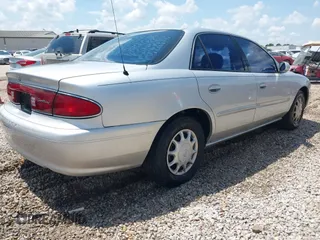 2004 Buick Century Custom with VIN 2G4WS52J641165337, listed as a IAAI auction lot 42196052 with Not Provided miles and . Bid and sale history available at carsss.com. Image 4.
