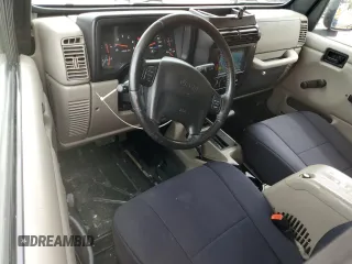 2004 Jeep Wrangler Sahara with VIN 1J4FA59SX4P722608, listed as a Copart auction lot 51223345 with 146,600 mi miles and Salvage title. Bid and sale history available at DreamBid. Image 8.