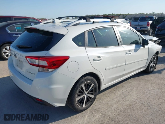 2019 Subaru Impreza Premium z VIN 4S3GTAD67K3741323, wystawiony jako IAAI lot #41979934 z przebiegiem 64 311 mil mil oraz . Historia ofert i sprzedaży dostępna na DreamBid. Obrazek 4.