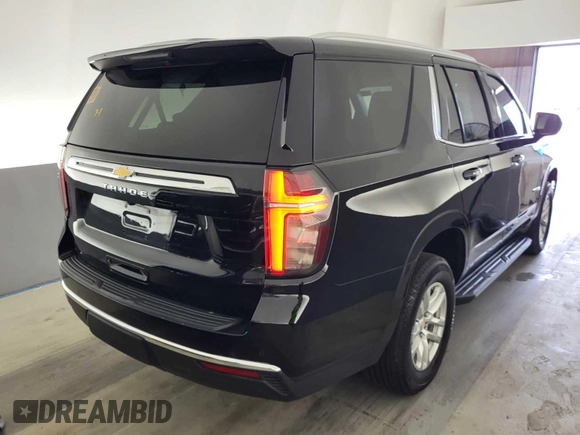 2023 Chevrolet Tahoe LS with VIN 1GNSKMKD8PR221675, listed as a IAAI auction lot 42796201 with 52,002 mi miles and . Bid and sale history available at DreamBid. Image 28.