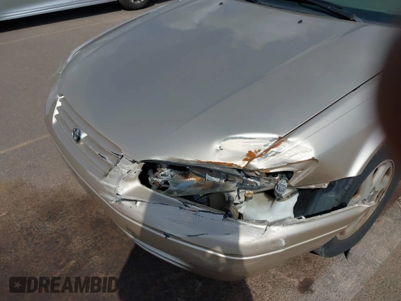 1999 Toyota Camry LE z VIN JT2BF22K9X0222119, wystawiony jako IAAI lot #41529258 z przebiegiem 119 919 mil mil oraz . Historia ofert i sprzedaży dostępna na DreamBid. Obrazek 6.