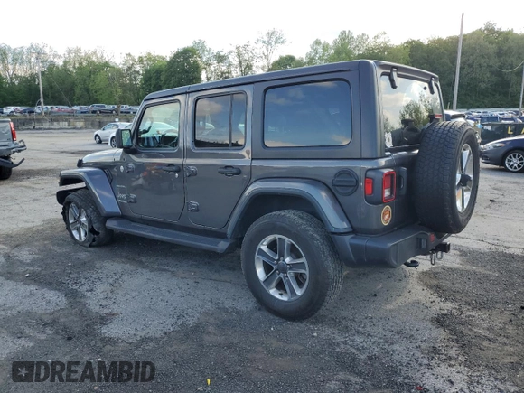 2022 Jeep Wrangler Unlimited Sahara z VIN 1C4HJXEN0NW110192, wystawiony jako Copart lot #57206625 z przebiegiem 32 964 mil mil oraz Szkoda całkowita • Salvage title. Historia ofert i sprzedaży dostępna na DreamBid. Obrazek 2.