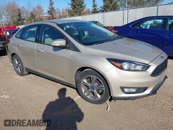 2018 Ford Focus SE with VIN 1FADP3FE8JL256698, listed as a IAAI auction lot 41757179 with 118,498 mi miles. Bid and sale history available at carsss.com. Image 1.