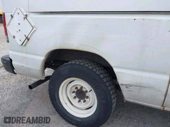 2010 Ford Econoline Cargo Commercial with VIN 1FTNE1EW2ADA91910, listed as a IAAI auction lot 42424530 with 186,898 mi miles and . Bid and sale history available at DreamBid. Image 12.