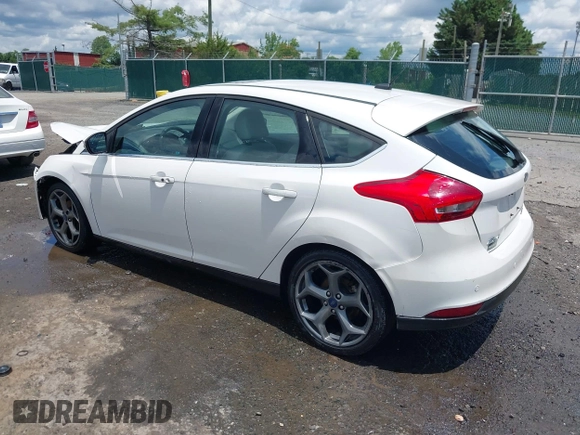 2016 Ford Focus Titanium with VIN 1FADP3N21GL309340, listed as a IAAI auction lot 42518653 with 101,555 mi miles and . Bid and sale history available at DreamBid. Image 3.