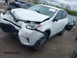 2018 Toyota RAV4 LE with VIN 2T3BFREVXJW793174, listed as a IAAI auction lot 42037936 with 82,304 mi miles. Bid and sale history available at carsss.com. Image 17.