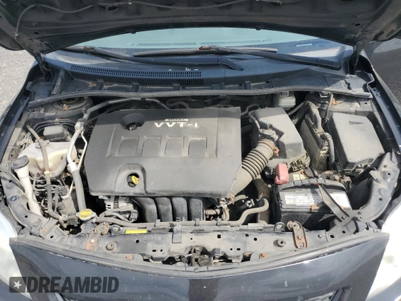 2010 Toyota Corolla z VIN 2T1BU4EE9AC498876, wystawiony jako Copart lot #60984755 z przebiegiem 198 095 mil mil oraz Szkoda całkowita • Salvage title. Historia ofert i sprzedaży dostępna na DreamBid. Obrazek 11.