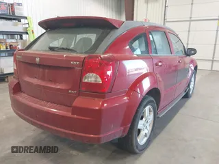 2009 Dodge Caliber SXT with VIN 1B3HB48A79D108706, listed as a IAAI auction lot 41555213 with 159,577 mi miles and . Bid and sale history available at DreamBid. Image 4.