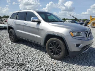 2014 Jeep Grand Cherokee Limited with VIN 1C4RJEBT7EC187543, listed as a Copart auction lot 51780935 with 191,617 mi miles and Clean Title. Bid and sale history available at DreamBid. Image 4.