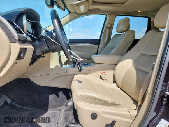 2014 Jeep Grand Cherokee Limited с VIN 1C4RJFBG1EC584268, выставлен на аукционе Copart как лот 61862595 с пробегом 140 926 миль миль и Списание • Salvage title. История ставок и продаж доступна на DreamBid. Изображение 7.
