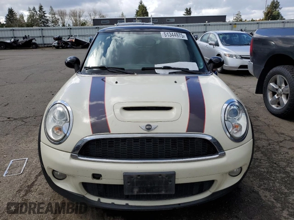 2009 MINI Hardtop S with VIN WMWMF73569TW84934, listed as a Copart auction lot 51344975 with 123,929 mi miles and Salvage title. Bid and sale history available at DreamBid. Image 5.