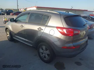 2013 Kia Sportage LX with VIN KNDPB3A26D7406680, listed as a IAAI auction lot 42004413 with 170,221 mi miles. Bid and sale history available at carsss.com. Image 3.