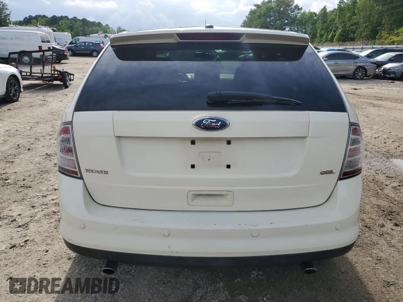 2008 Ford Edge SEL z VIN 2FMDK38C08BA37731, wystawiony jako Copart lot #55872035 z przebiegiem 196 943 mil mil oraz Szkoda całkowita • Salvage title. Historia ofert i sprzedaży dostępna na DreamBid. Obrazek 6.