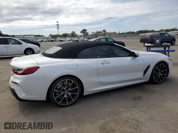 2019 BMW 8 Series M850i xDrive with VIN WBAFY4C54KBX29575, listed as a Copart auction lot 71558594 with 37,627 mi miles and Salvage title. Bid and sale history available at DreamBid. Image 3.