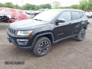 2019 Jeep Compass Trailhawk with VIN 3C4NJDDB7KT727762, listed as a IAAI auction lot 42299260 with 56,733 mi miles and . Bid and sale history available at DreamBid. Image 19.