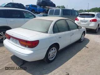 2002 Saturn SL z VIN 1G8ZK52772Z218812, wystawiony jako IAAI lot #42763871 z przebiegiem 86 338 mil mil oraz . Historia ofert i sprzedaży dostępna na DreamBid. Obrazek 4.