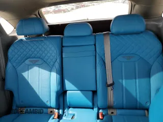2022 Bentley Bentayga V8 z VIN SJAAM2ZV9NC011752, wystawiony jako Copart lot #79142714 z przebiegiem Nie podano mil oraz Nie do naprawy. Historia ofert i sprzedaży dostępna na DreamBid. Obrazek 10.