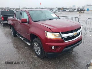 2018 Chevrolet Colorado 2WD LT z VIN 1GCGSCEA0J1206636, wystawiony jako IAAI lot #41425144 z przebiegiem 149 920 mil mil oraz . Historia ofert i sprzedaży dostępna na DreamBid. Obrazek 1.
