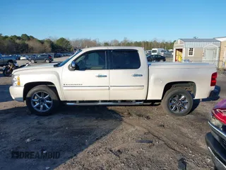 2009 Chevrolet Silverado 1500 with VIN 3GCEC33J49G178179, listed as a IAAI auction lot 41810627 with 205,823 mi miles and . Bid and sale history available at DreamBid. Image 14.