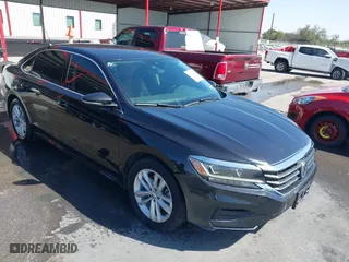 2020 Volkswagen Passat 2.0T SE with VIN 1VWWA7A34LC024309, listed as a IAAI auction lot 41839846 with 133,999 mi miles. Bid and sale history available at carsss.com. Image 1.