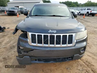 2011 Jeep Grand Cherokee Laredo z VIN 1J4RR4GG0BC518726, wystawiony jako Copart lot #58985765 z przebiegiem 163 625 mil mil oraz Szkoda całkowita • Salvage title. Historia ofert i sprzedaży dostępna na DreamBid. Obrazek 5.