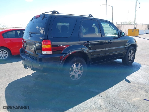 2005 Ford Escape Limited with VIN 1FMCU94165KE32639, listed as a IAAI auction lot 41960732 with 204,979 mi miles. Bid and sale history available at carsss.com. Image 4.