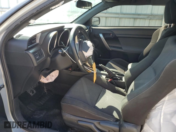 2014 Scion tC z VIN JTKJF5C79E3067932, wystawiony jako Copart lot #50425555 z przebiegiem Nie podano mil oraz Szkody całkowita. Historia ofert i sprzedaży dostępna na DreamBid. Obrazek 7.