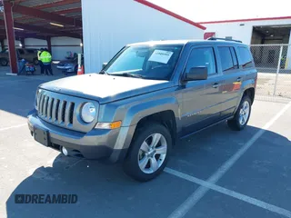 2014 Jeep Patriot Sport with VIN 1C4NJRBB5ED574390, listed as a IAAI auction lot 41949395 with 61,911 mi miles. Bid and sale history available at carsss.com. Image 2.